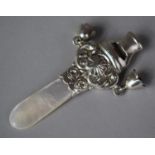 A Silver and Mother of Pearl Teether, Rattle and Whistle, Hallmarked and Stamped 925