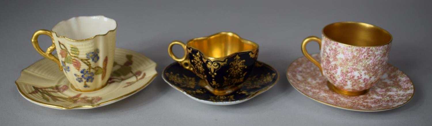 Three Miniature Cabinet Cups and Saucers to Include Gilt and Black Glazed Coalport and Two Royal