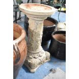 A Carved Wooden Patio Stand with Circular Top Decorated in Relief with Vine Leaves and Grapes, 34.