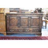 A 19th century Oak Three Panelled Coffer Chest with Two Base Drawers, Later Carving, 119cm wide