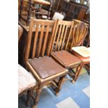 A Pair of Edwardian Oak Framed Kitchen Chairs