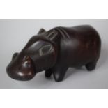 A Carved Souvenir Study of a Hippo Calf, 19cm Long