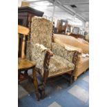 An Edwardian Oak Framed Upholstered Armchair with Barley Twist Supports and Stretchers, For