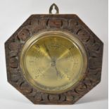 A Mid 20th Century Carved Oak Octagonal Wall Hanging Barometer with Brass Bell, 23cm Diameter