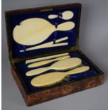 A Late Victorian Cased Ivory Dressing Set with Brushes Mirror, Glove Stretcher, Comb etc in