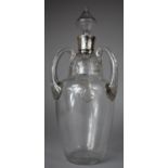 A Silver Topped Three Handled Tyg Decanter, Stapled Repair to Neck, 29cm high