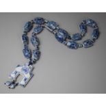 A Chinese Porcelain Blue and White String of Beads with Pinyin Character Pendant