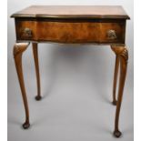 An Edwardian Walnut Serpentine Front Side Table with Single Long Drawer on Extended Cabriole