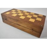 A Late 19th/Early 20th Century Inlaid Walnut Games Box with Chessboard Outer and Paper Backgammon