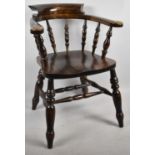 A 20th Century Spindle Back Smokers Bow Armchair