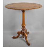 A Late 19th Century Oval Topped Walnut Tripod Table, 65cm wide