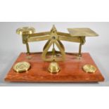 A Reproduction Brass Set of Postage Scales with Weights on Wooden Plinth, 18cm wide