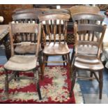 A Harlequin Set of Eight Kitchen Chairs