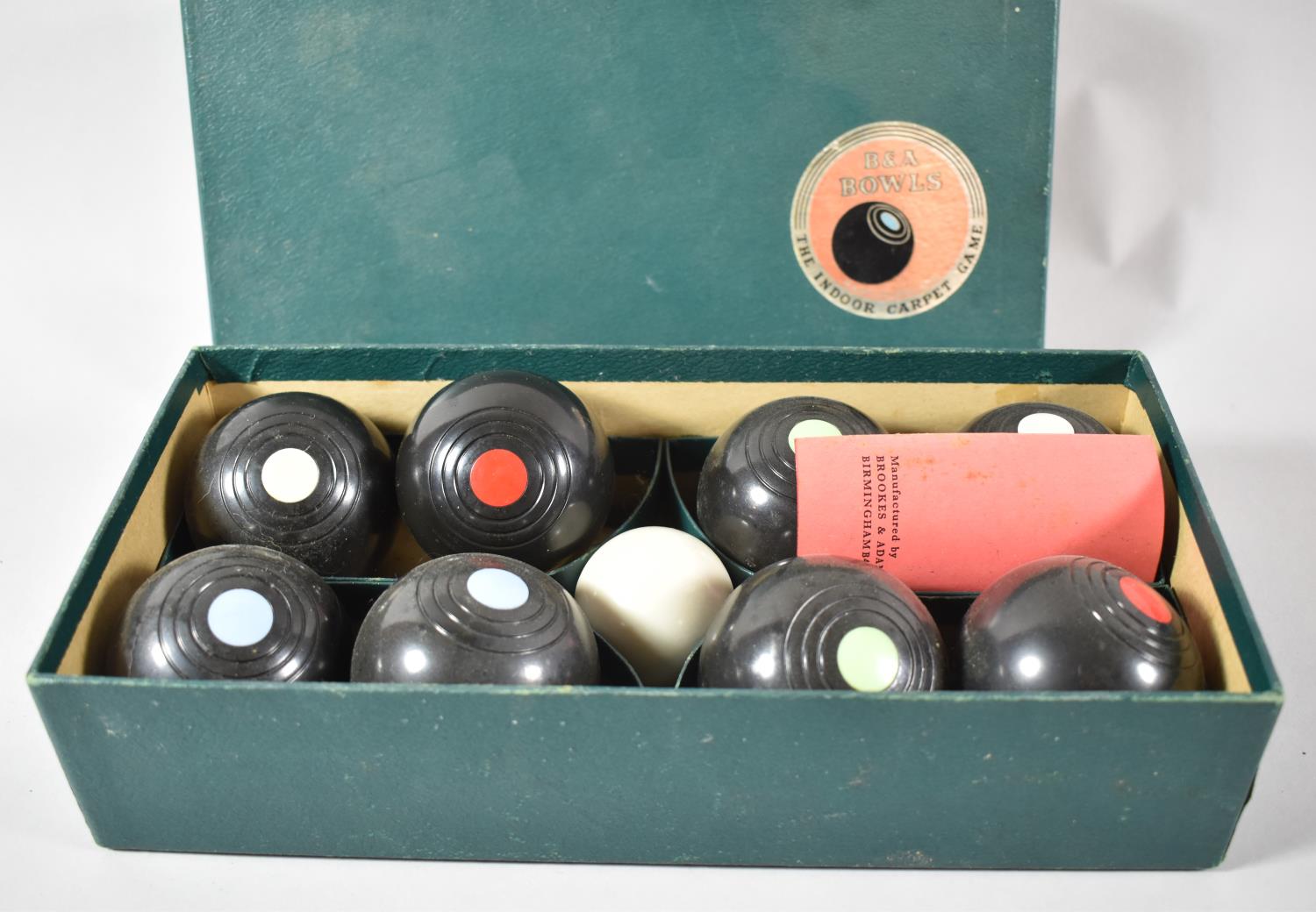 A Cased Set of Brookes and Adams Indoor Carpet Bowls, with Instructions - Image 2 of 2