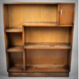 An Edwardian Oak Bookcase with Shaped Shelves and Small Cupboard to Top Right Hand Corner, 76cm wide