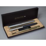 A Sheaffer Pen Box Containing Two Cartridge Pens and One Ball Point