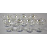 A Collection of Eight Babycham Glasses