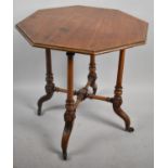 An Edwardian Octagonal Walnut Occasional Table on Turned Supports, 64cm Diameter