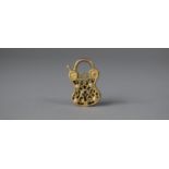 A 9ct Rose and Yellow Gold Pendant in the Form of a Pierced Padlock, 4.3g