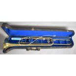 A Cased Brass Trombone, La Fleur Imported by Boosey and Hawkes, London