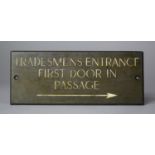 A Bronze Door Sign, "Tradesman's Entrance First Door in Passage", 16x6.5cm