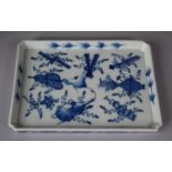 A Chinese Blue and White Rectangular Tray Decorated with Interior Objects and Swags and Having