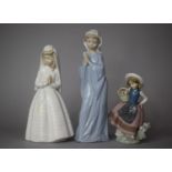 One Lladro and Two Nao Figures
