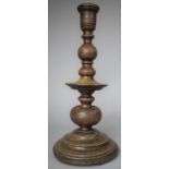 A 19th Century Turned Oak Candlestick with Inlaid Pewter Stringing, 35cm high