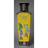 A Large Chinese Vase Decorated with Figures in Multicoloured Enamels on Yellow and Black Ground,