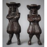 A Pair of Carved Wooden Dutch Cigar Indians in the Form of Long Haired Gents with Hats, Crossed