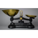 A Pair of Libra Cast Iron Kitchen Scales with Brass Pans