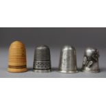 A Collection of Three Silver Thimbles and Turned Wooden Beehive Example