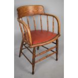 An Edwardian Spindle Back Tub Armchair