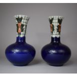 A Pair of Wood and Sons Trellis Pattern Vases with Cobalt Blue Bodies and Tube Lined Decoration,
