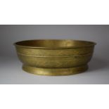 A Circular Indian Bronze Bowl, the Sides Intricately Engraved with Leaves and Geometric Patterns,