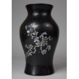 An Oriental Lacquered Vase with Mother of Pearl Inlay, 22cm High