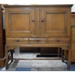 A Mid 20th Century Dining Room Side Cabinet with Three Base Drawer Including Cutlery Drawer, Two