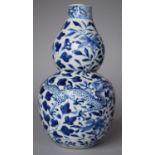 A 19th century Chinese Blue and White Double Gourd Vase, 18.5cm high, Chips to Rim