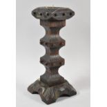 A Modern Carved Wood and Hobnail Decorated Candle Pricket, 33cm high
