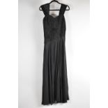 A Vintage Ladies Black Ball Gown with Beadwork Decoration