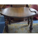 A Late 19th Century Oak Wind Out Extending Dining Table with Oval Top on Barley Twist Supports, with