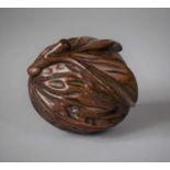 A Carved Wooden Novelty Box in the Form of a Walnut, 6.25cm high