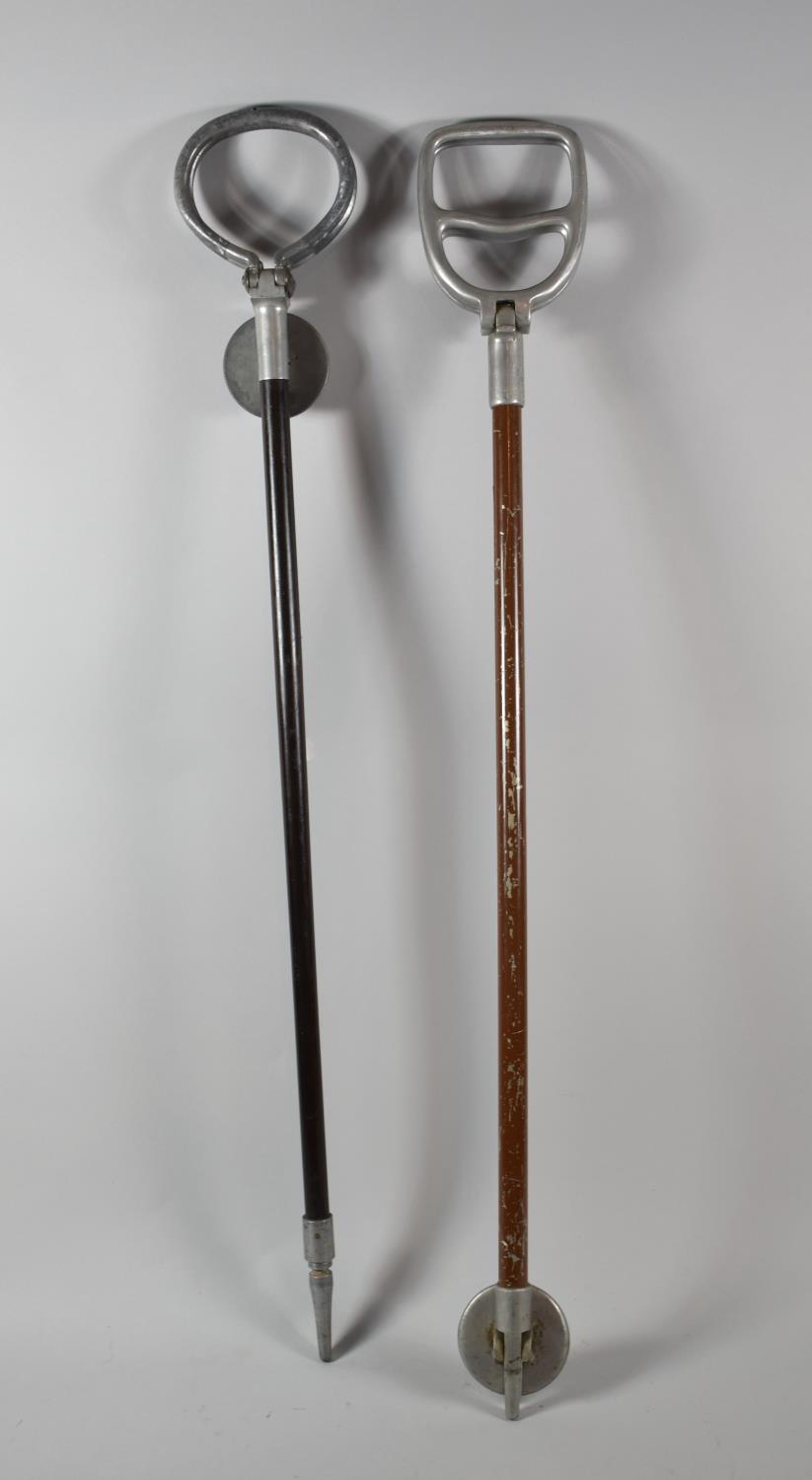 A Pair of Vintage Shooting Sticks