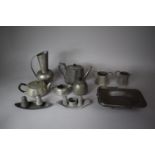 A Collection of Various Pewter Wares to Include Jugs, Sugar Bowls, Teapots, Cruets etc