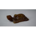 A Carved Jade Study of a Tortoise with Young on Back, 6cm Long