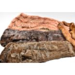 A Collection of Three Fur and One Faux Fur Stoles