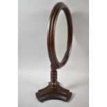 A Modern Mahogany Oval Dressing Table Mirror, 45cm high