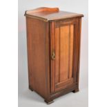 An Edwardian Galleried Bedside Cabinet with Panelled Door to Shelved Interior, 38cm wide