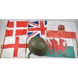 An American Military Helmet and Collection of Flags