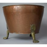 A Circular Copper Planter with Three Brass Claw Feet, 28cm Diameter